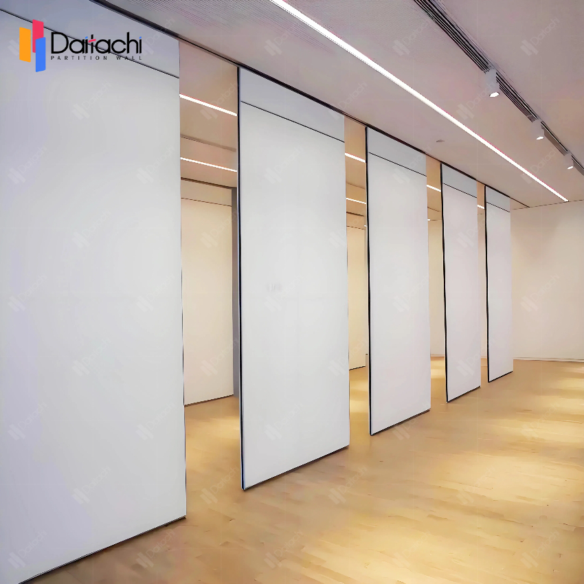 White manual movable partition wall in empty meeting room
