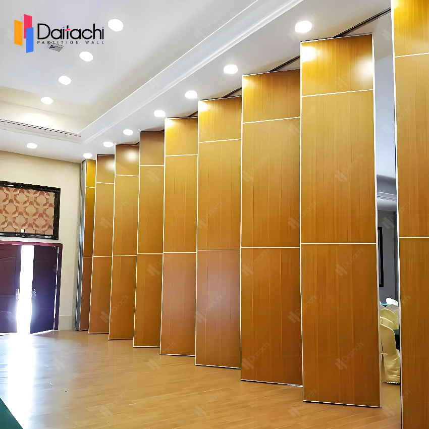 The light wood color manual movable partition wall system echoes the wood color floor