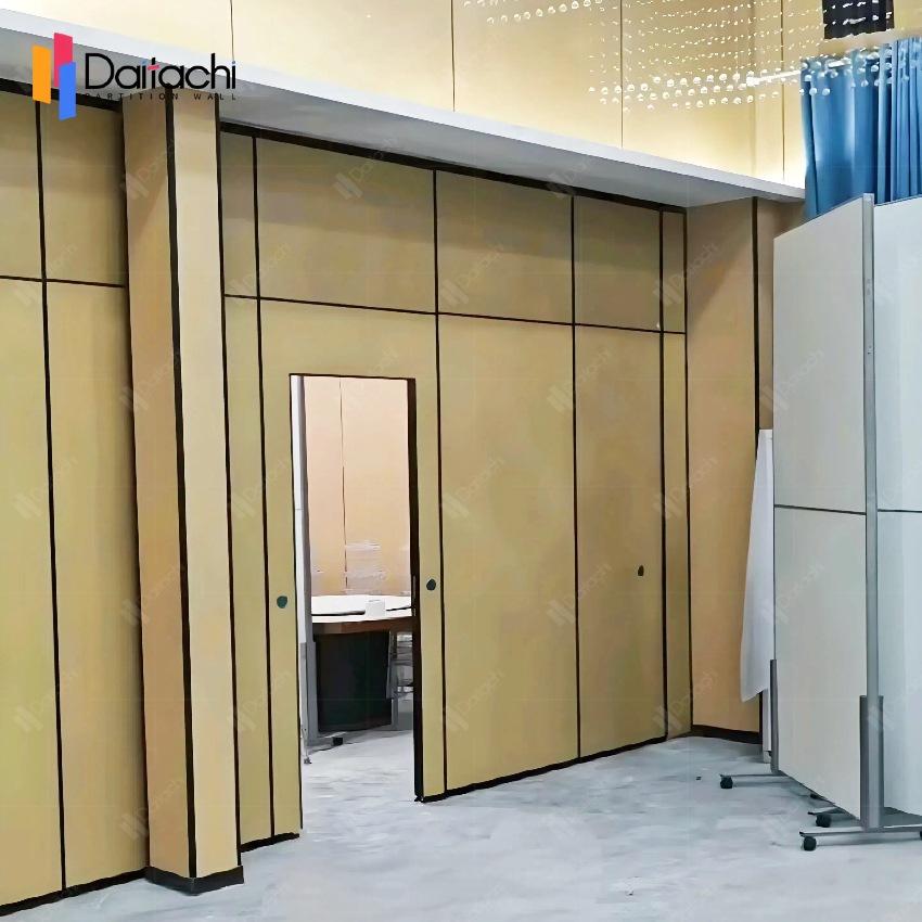 Light brown movable partition wall with doors in the office area